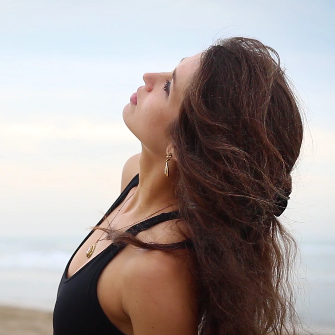 profielfoto Michelle op het strand in dansflow